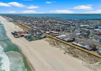 Stylish Seaside Home with Parking Beach Passes and 5-Minute Walk to the Beach