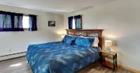 Spacious and cozy home with gas fireplace, boat dock, and lake views
