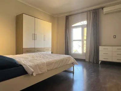 Sunny Elegant apartment in wonderful New Cairo Near AUC with WiFi, AC Hotels in El Matareya