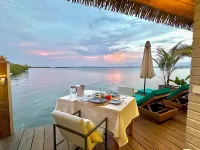 Ocean Light Over Water Bungalow, Bedroom, King Bed, Living Room, Kitchenette