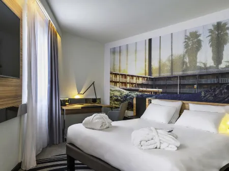 Novotel Saint-Étienne Centre Gare Châteaucreux Отели в г. Л'Орм