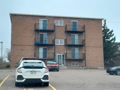 Executive 2BR Apartment | Walk to Hospitals | In-Unit Gym + Wi-Fi