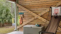 Folly Beach Getaway Near Sand Covered Lounge, BBQ & Outdoor TV Tidecrest by Avantstay