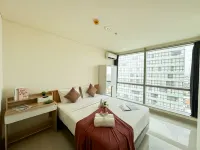 Lovely and Vibrant 2BR Space at Praxis Apartment by Travelio