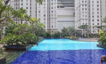 Homey 2BR at Green Bay Pluit Apartment near Mall
