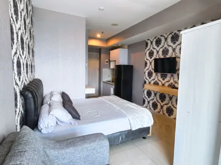 Apartemen Grand Kamala Lagoon Bekasi by Aparian Отели в г. West Bekasi