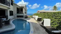 Nestled in the Heart of Fitts Village, Zinnia Becons with the Promise of a Costa Hoteles cerca de Fitts Village Beach