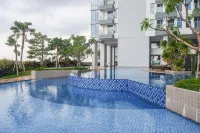 Best Price and Comfortable Living 2Br at Anderson Supermall Mansion Apartment by Travelio - Spor Salonu