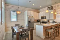 In-town coastal getaway, with a heated pool & level 2 Tesla EV charger on site.