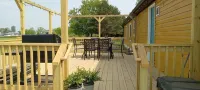 Family friendly bungalow with big yard and deck, close to town