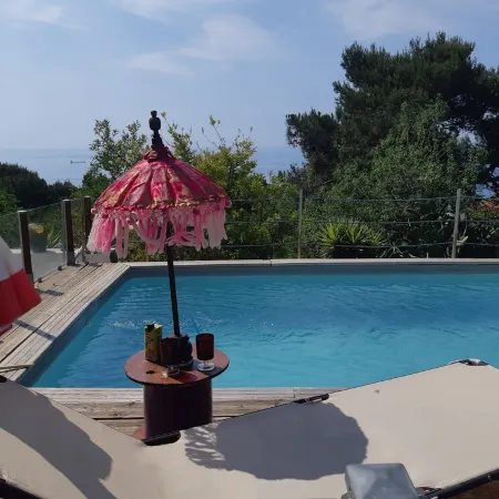 Top of villa, terraces, swimming pool at Mont St Clair, pétanque court with sea view