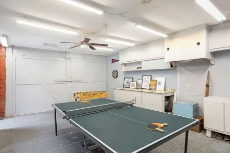 Family compound in North Tacoma!  Large house, guest house, game room, koi pond!