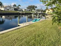 RUM CAY GETAWAY: South facing waterfront home, private pool/spa, bar, and dock.