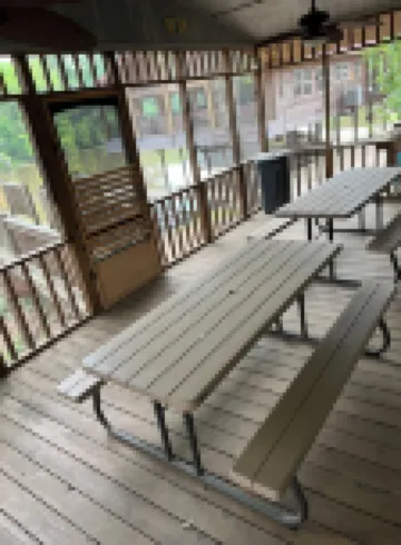 Two Story House with Deck over the River