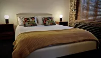 Spacious studio apartment with 20th Century Modern design in an industrial space