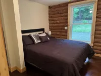 Beautiful private beach area within steps from the modern updated log home