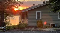 Find your happy place at Big Swan Lake. Enjoy peaceful sunsets. Pets welcome.