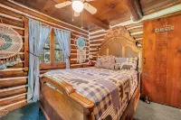 Rustic Rest Log Cabin, with hot tub and trout stream, near Poconos attractions.