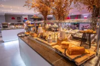 Kyriad Prestige Lyon Est - Saint Priest Eurexpo Hotel and Spa - Desayuno