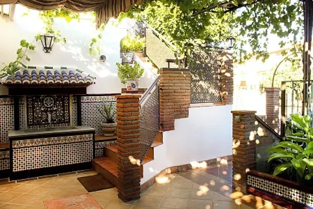 Apartamentos Turísticos Cúllar Vega Отели рядом с достопримечательностью «Terminal 1 of Granada Airport»