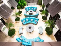 Impressive 2nd-Floor Unit in Coco Done in Red and Orange Hues