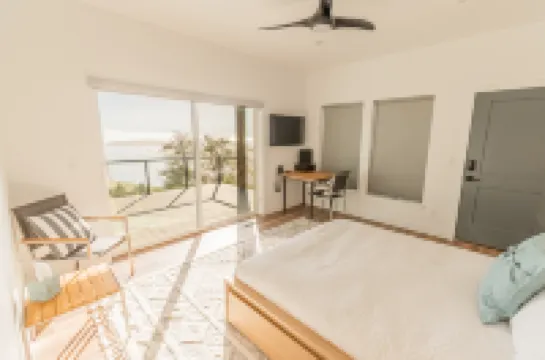 Stunning Bay Views and Cozy Amenities - Modern Coastal Getaway