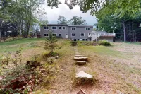 Waterfront home with hot tub, deck, patio, grill, firepit, Ping-Pong, & WiFi Hotels near Acadia National Park