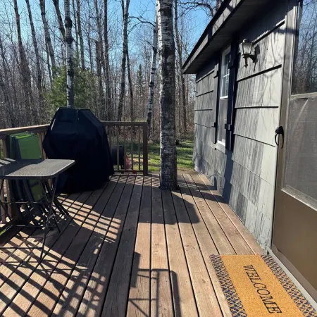 Charming cabin in delightful Duquette with AC near miles of ATV trails.