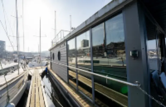 Houseboat Luv in Sonwik harbor with a view of Denmark