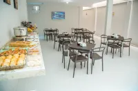 Hotel e Pousada Flor do Juá - breakfast