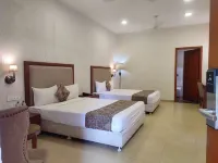Palm Green Club Hotel di Malarpura