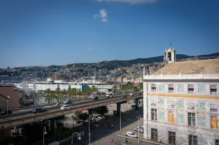 San Giorgio Rooms Отели рядом с достопримечательностью «Палацци-деи-Ролли»