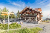 Rinderberg Swiss Alpine Lodge Hoteles cerca de Cheval Blanc
