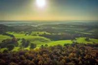 Farley; woodland lodge for 8 with hot tub, log burner, BBQ, near Alton Towers.