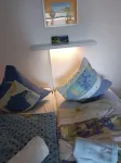 Vacation apartment with lake view, close to the beach with WiFi, dishwasher, microwave