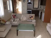 2 bed self contained furnished flat with pool, 5 mins from town and beach.