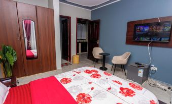 The Den Soroti Red & White