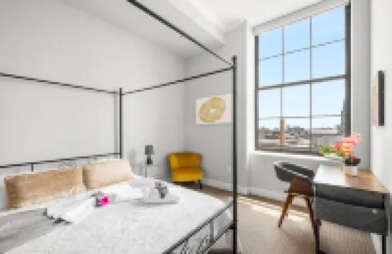 Rooftop Pool and Gym Access - Stylish Urban Oasis