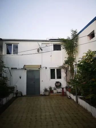 duplex house raizet Отели в г. Les Abymes