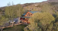 Majestic lake views on 20 private acres with hot tub