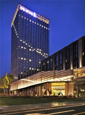 the Lotus Hotel Отели рядом с достопримечательностью «Chongqing Vocational College of Electronic Engineering University City Campus - Mechanical and Electrical Engineering Center»