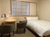 Plaza Inn Hamura Hotels near Hinatawada Station