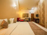 The Center Court Resort & Spa فنادق في Orlim