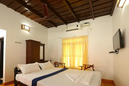 Palmy Lake Resort Отели рядом с достопримечательностью «Кидангампарамбу Сри Буванесвари Темпл»