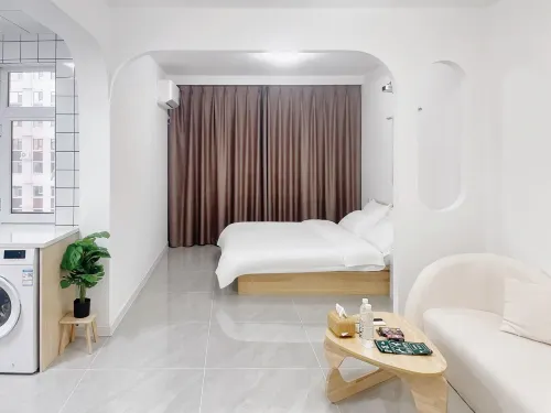 Yanji Shiguang Yanbian University Homestay (Yanhe Road Branch) - Condos