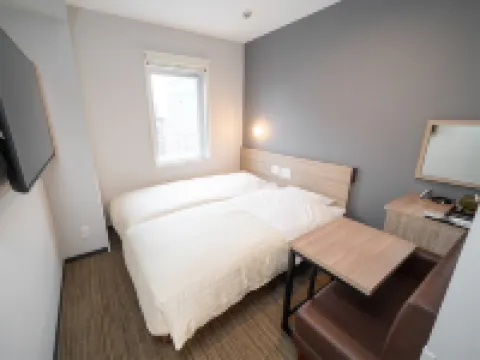 Super Hotel Okayama Station Higashiguchi Hotel di 