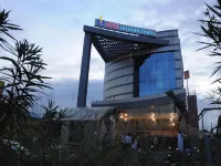Sanu International - Parkplatz