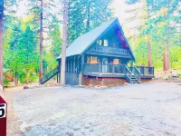 Modern A-Frame cabin that is a nice stroll down to the lake.