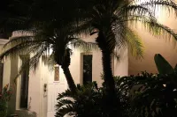 Tropical Bliss: Private Heated Pool, Steps from the Drive, Minutes to the Beach!