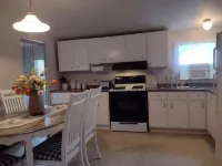 Log Cabin Guest House 이스트 람피터 타운쉽 호텔